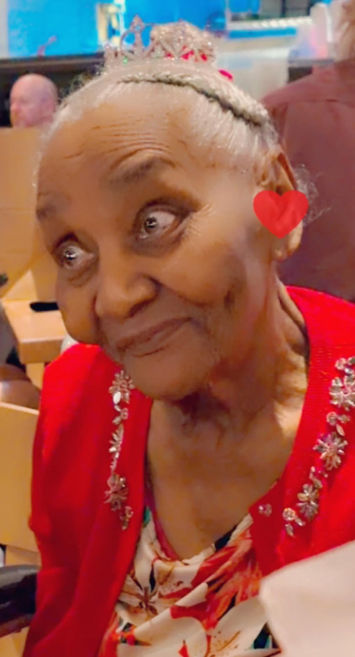 A woman in a red shirt