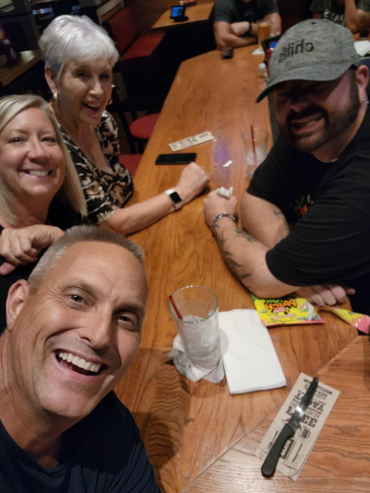 A group of people sitting at a table