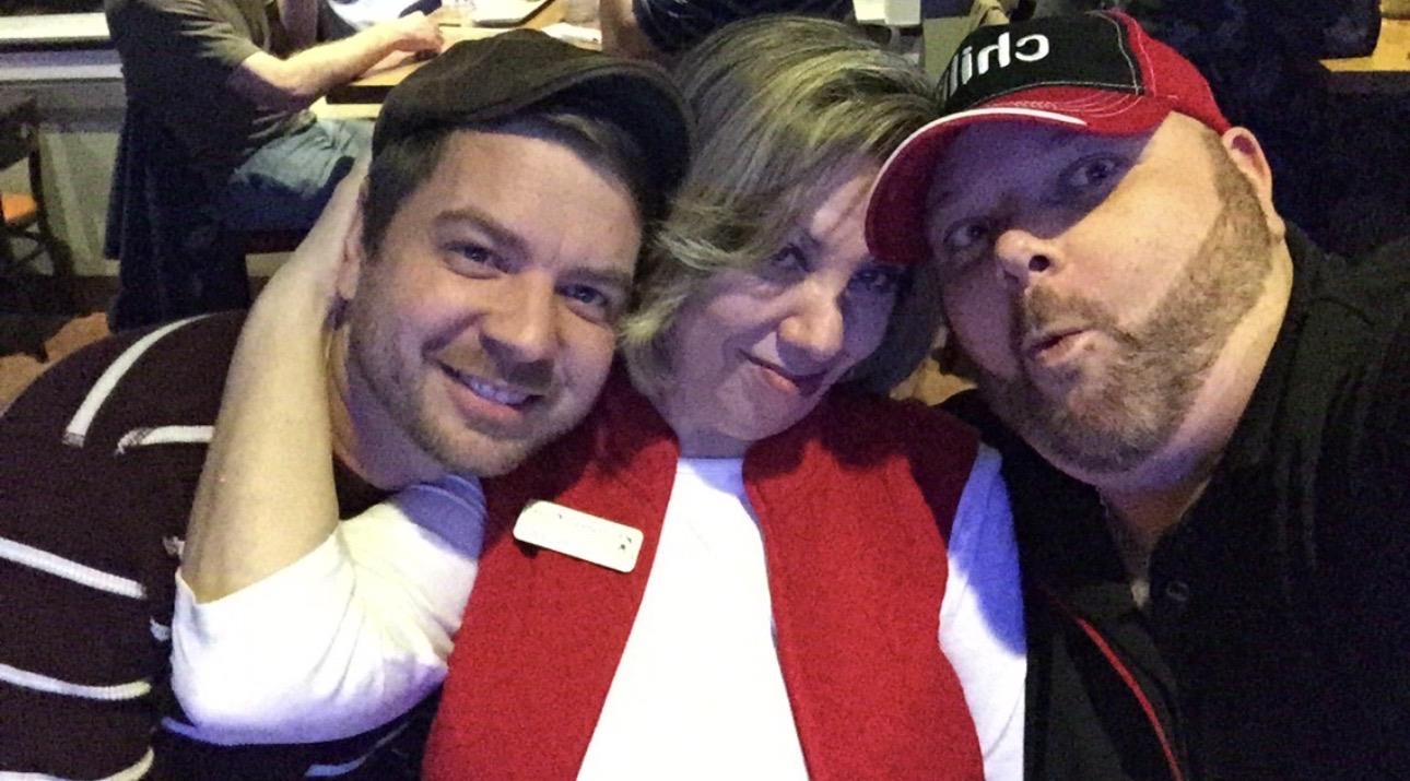 A group of people posing for a selfie