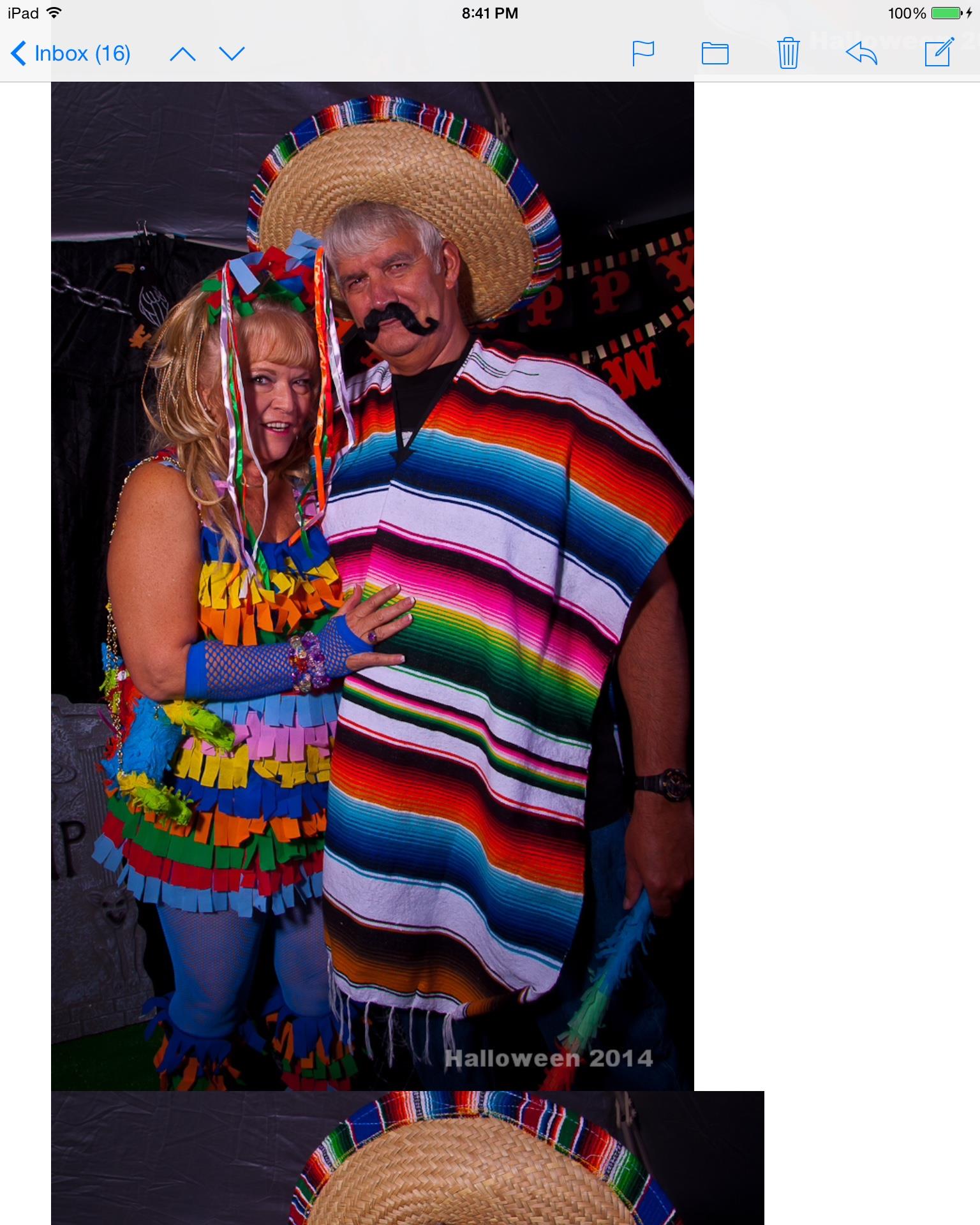 A man and woman dressed up in clothing
