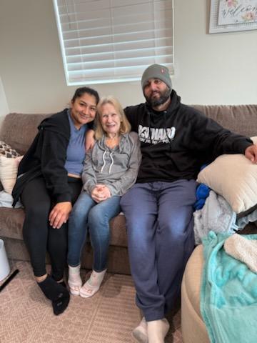 A group of people sitting on a couch