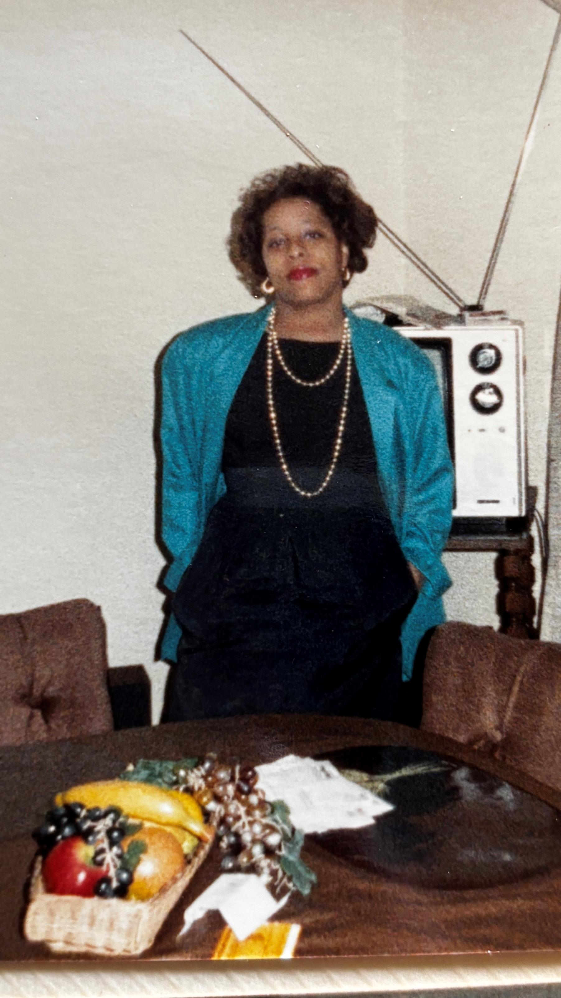 A woman in a blue jacket