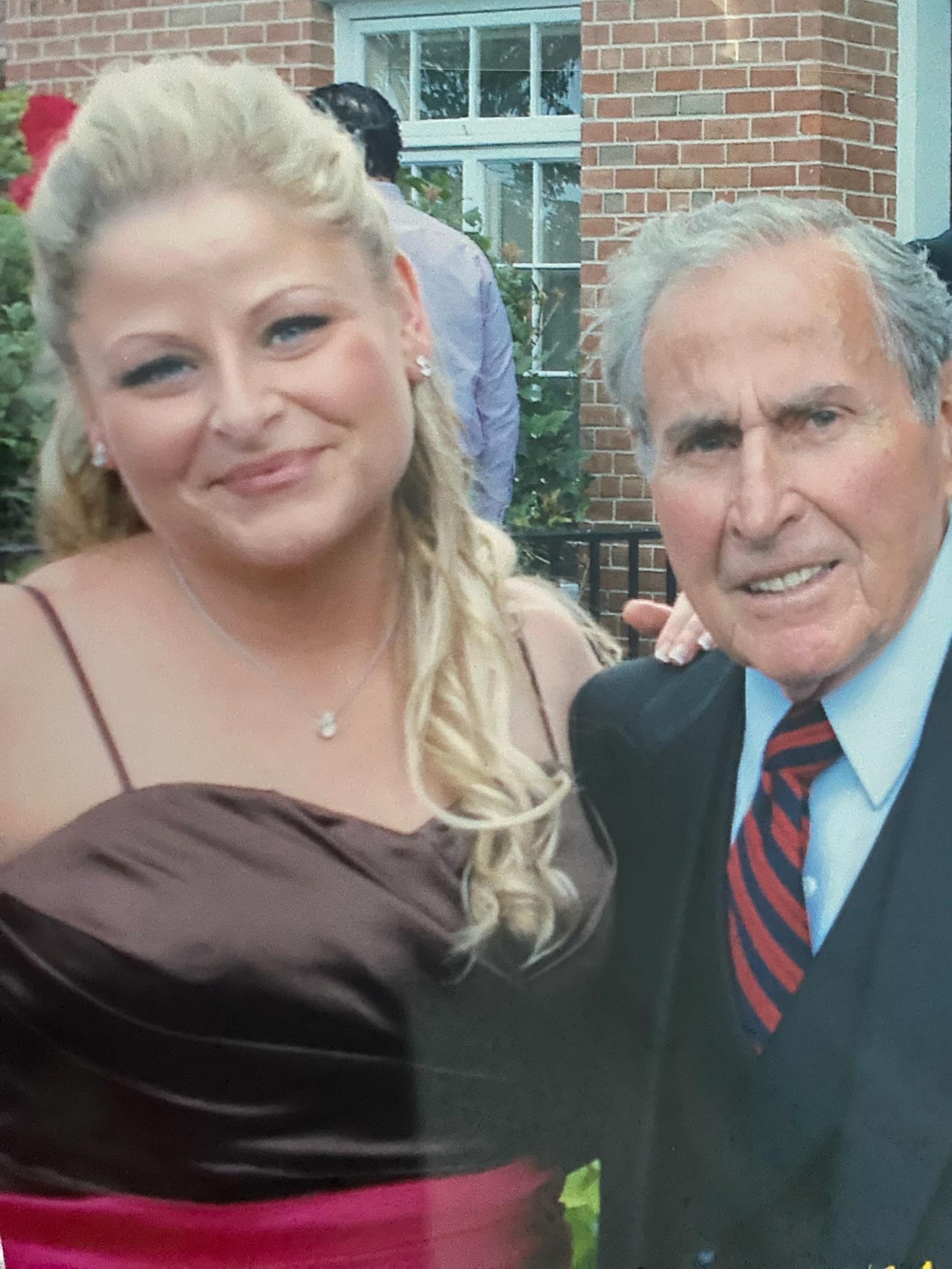 A man and woman posing for a picture