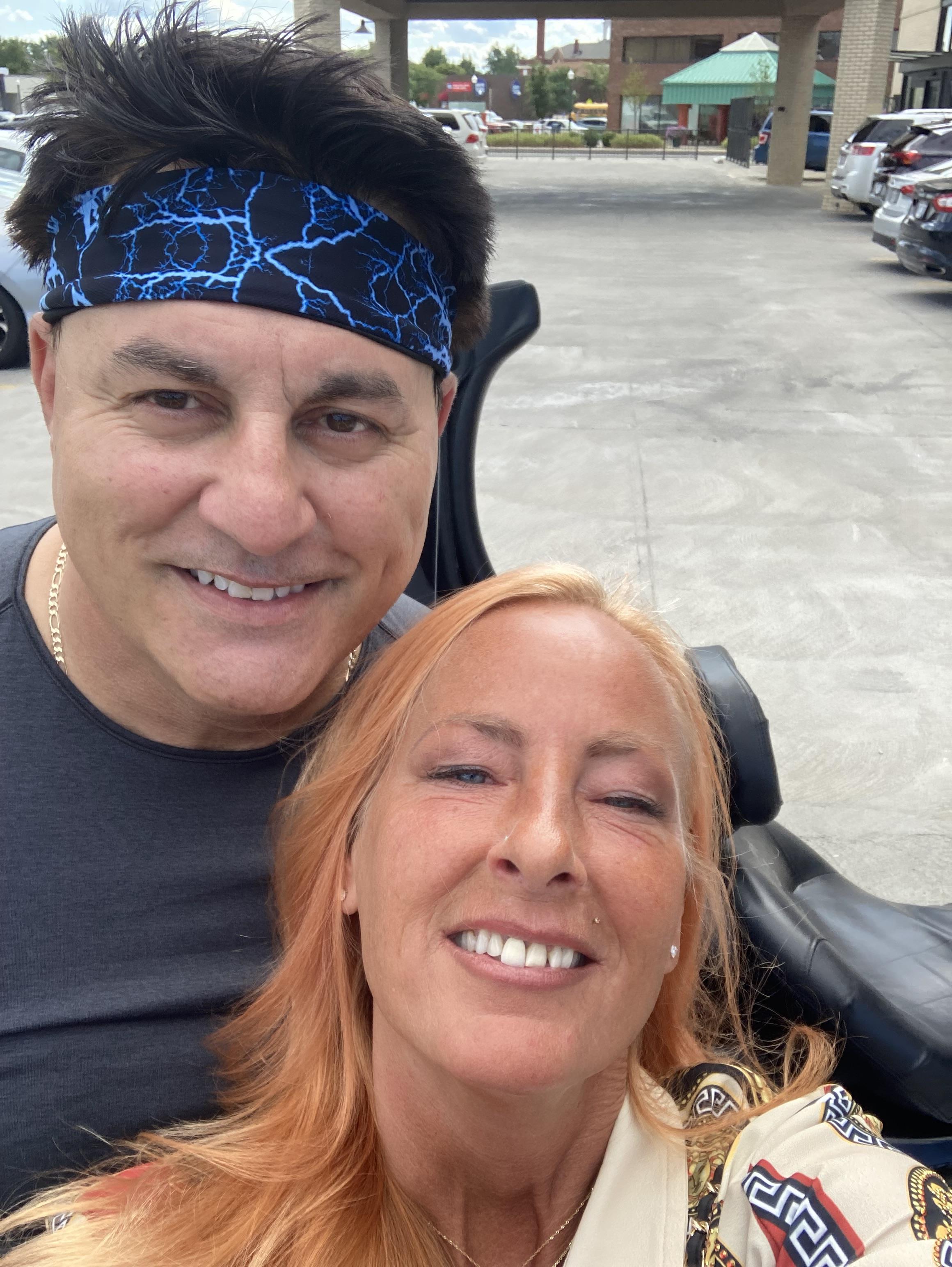 A man and woman taking a selfie