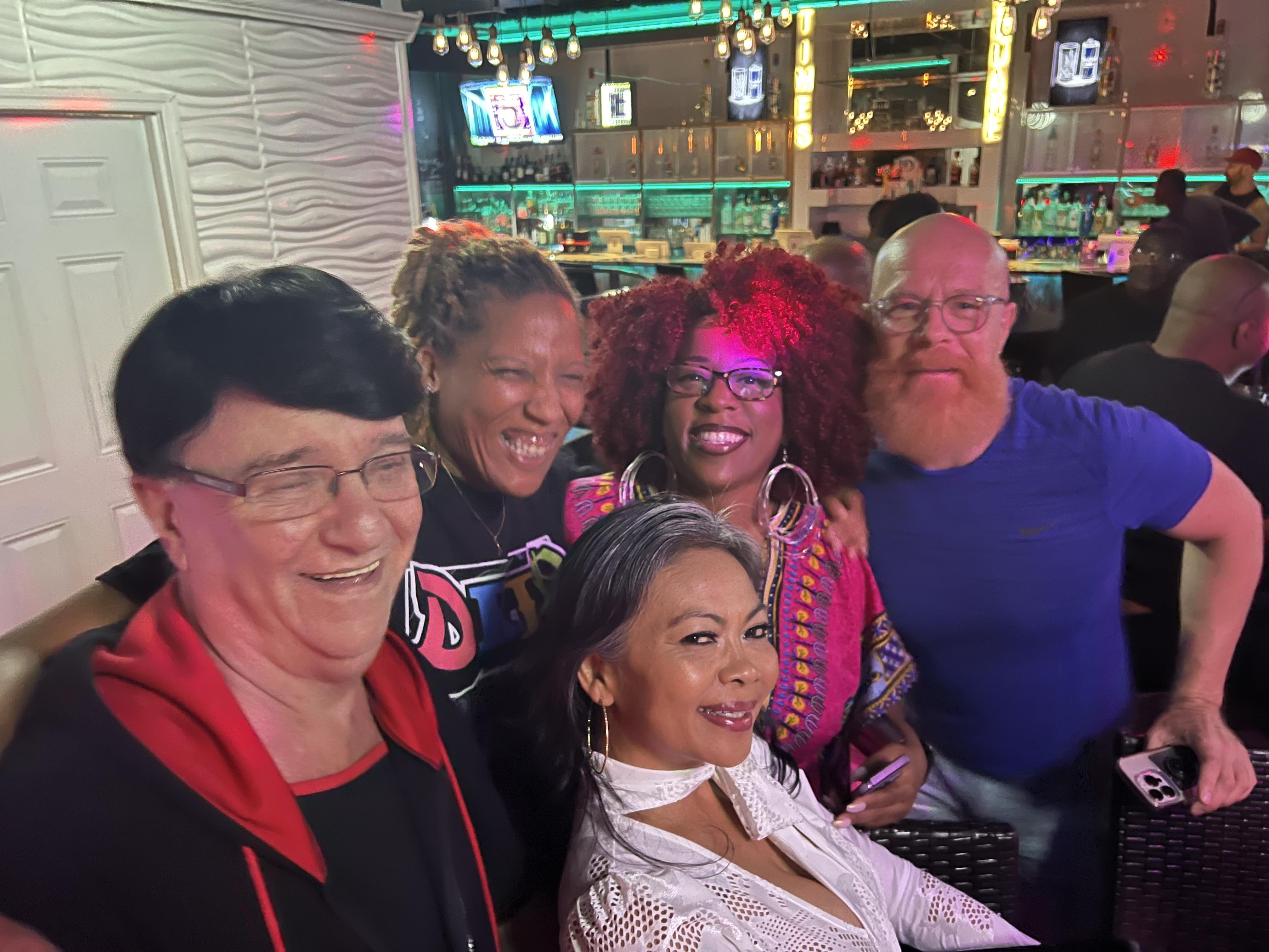 A group of people posing for a photo