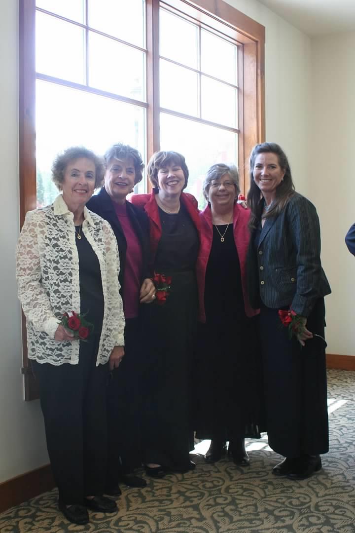A group of women posing for a photo