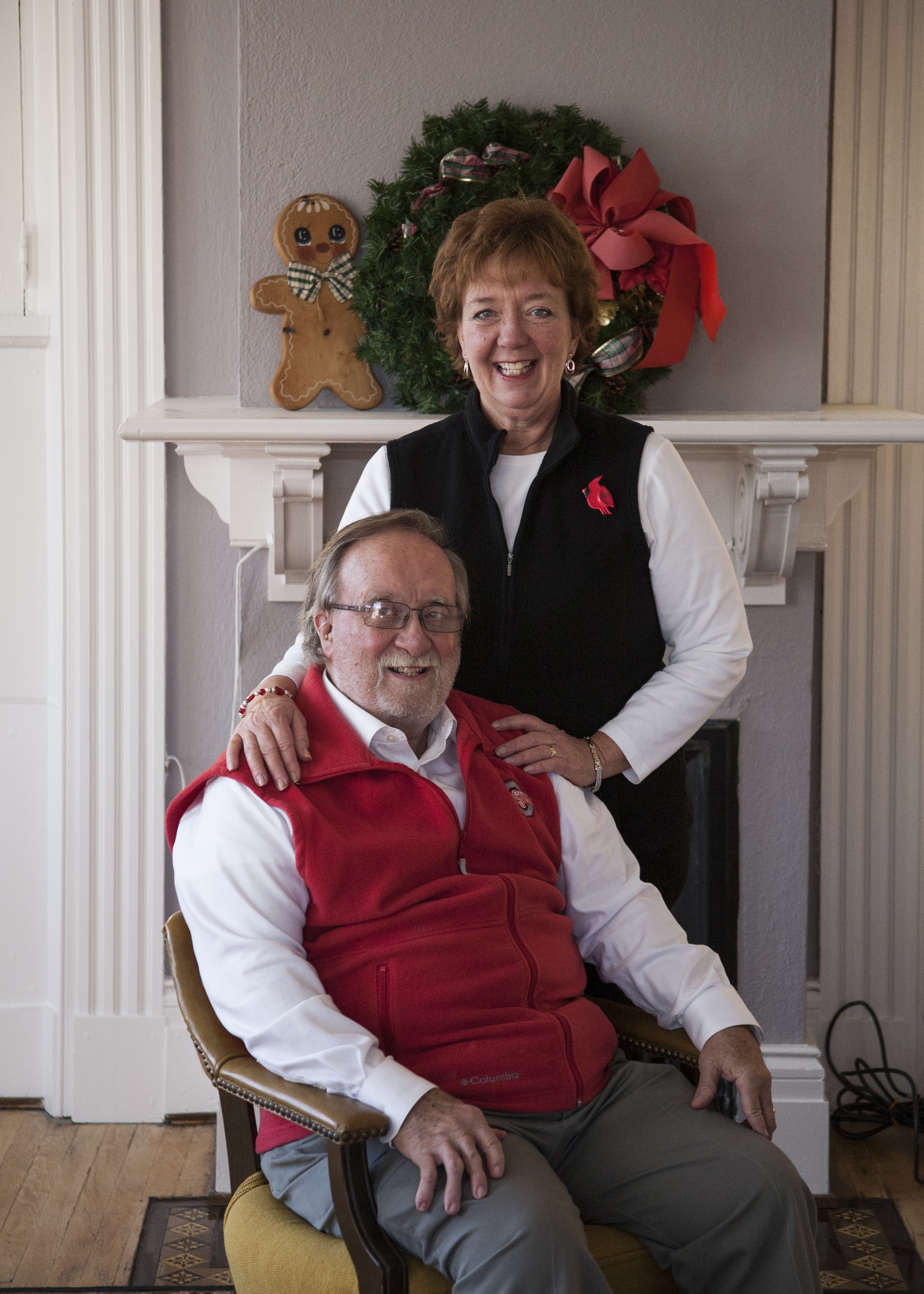 A woman standing next to a man