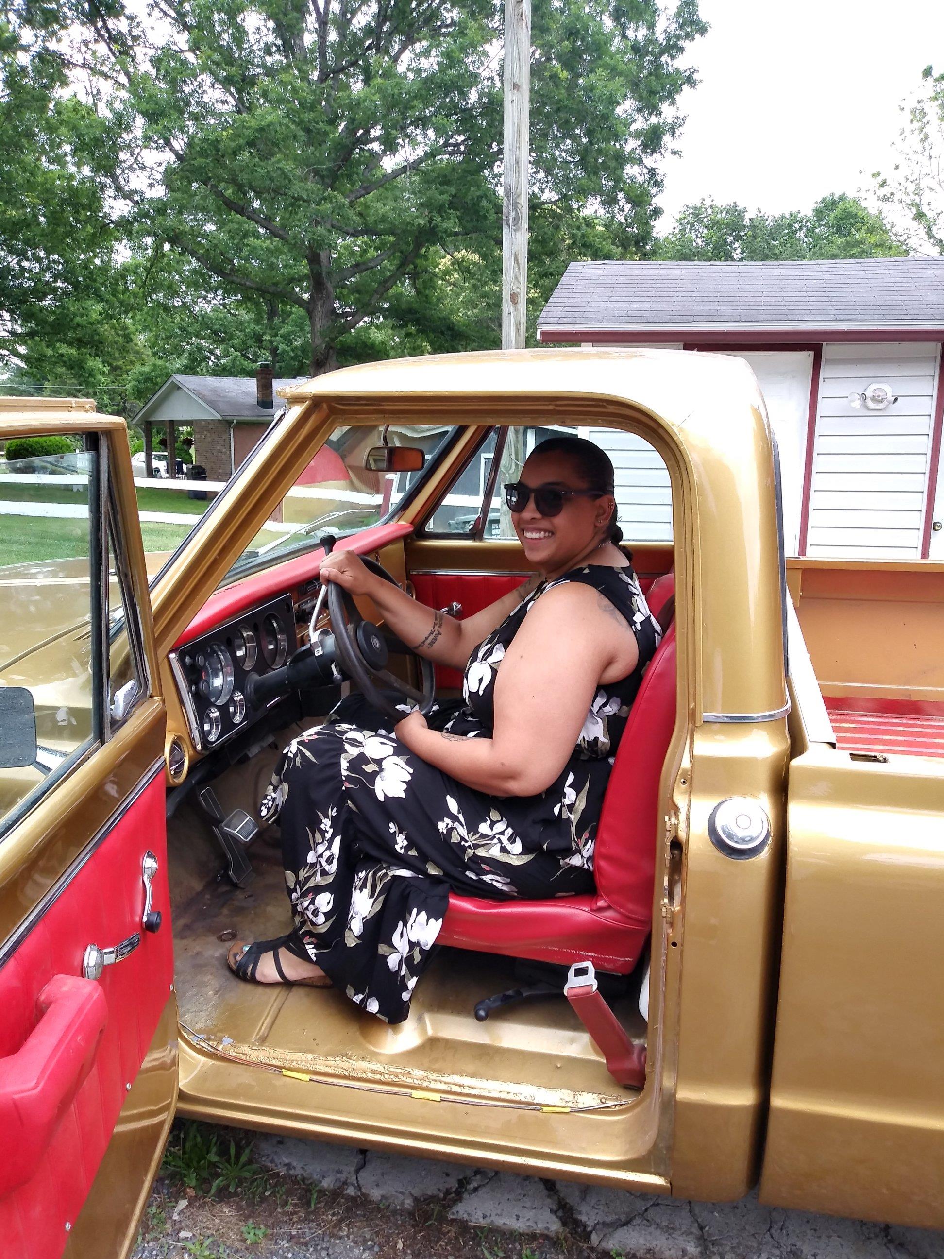 A woman sitting in a car