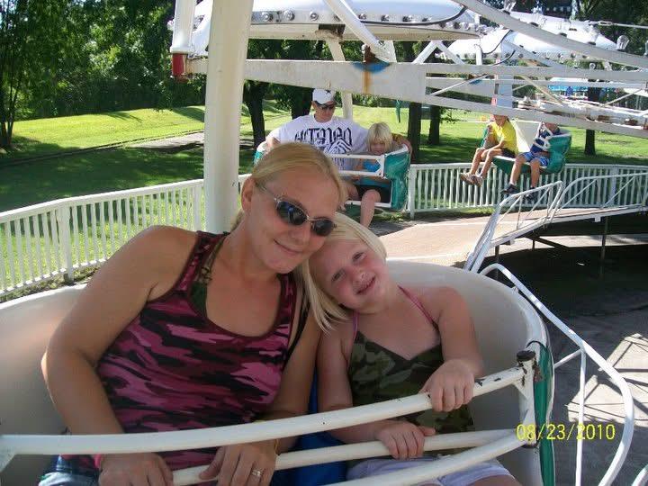 A woman and a girl on a ride