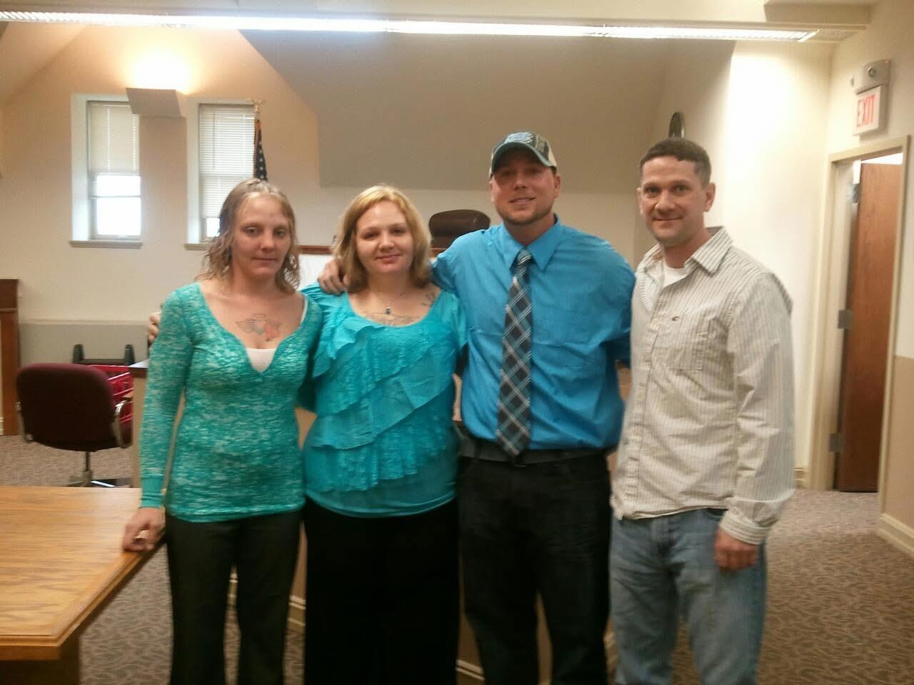 A group of people posing for a photo