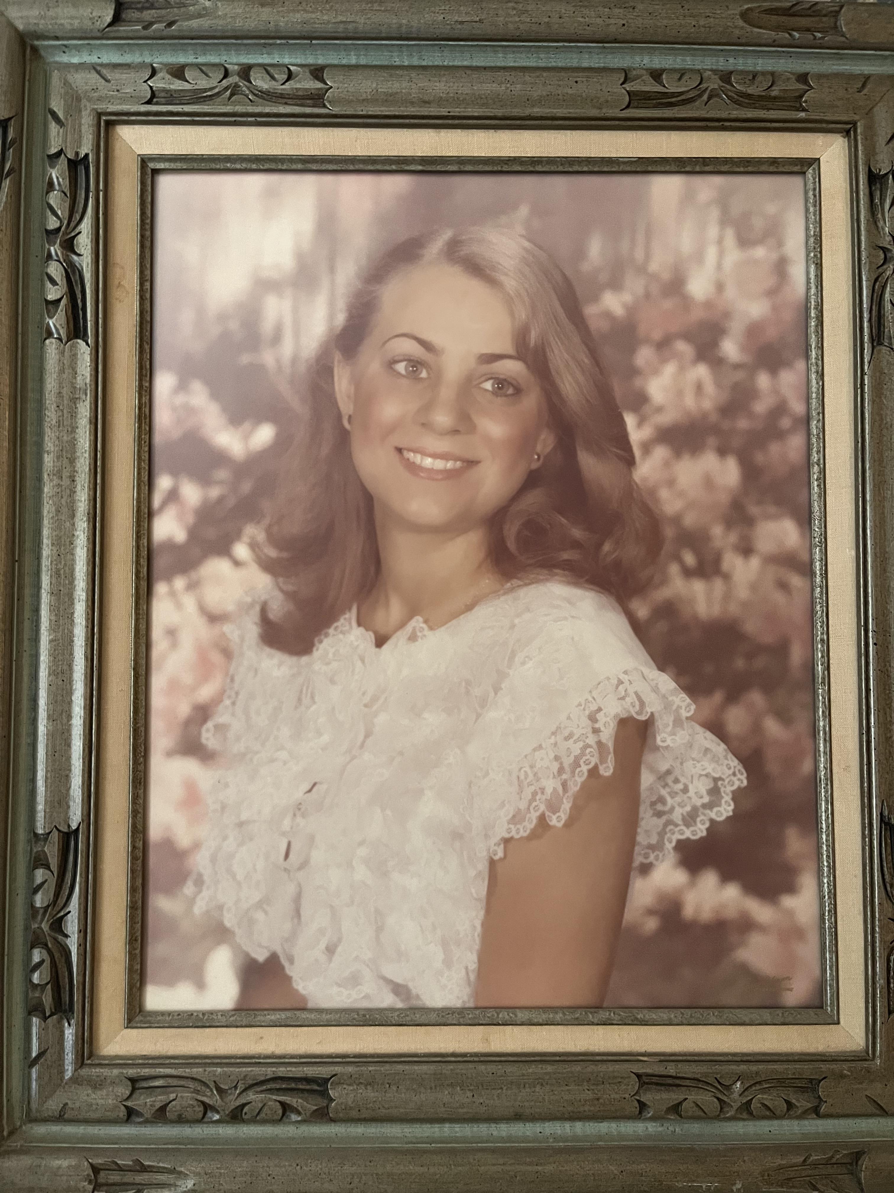 A framed picture of a woman