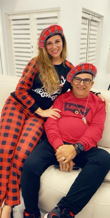 A man and woman posing for a picture