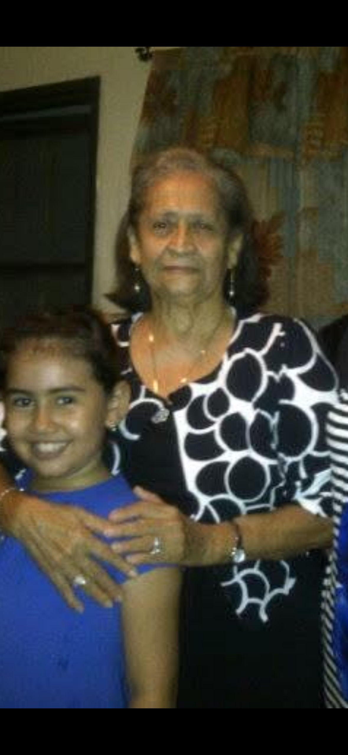 A woman holding a child