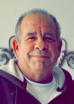 A man smiling for the camera