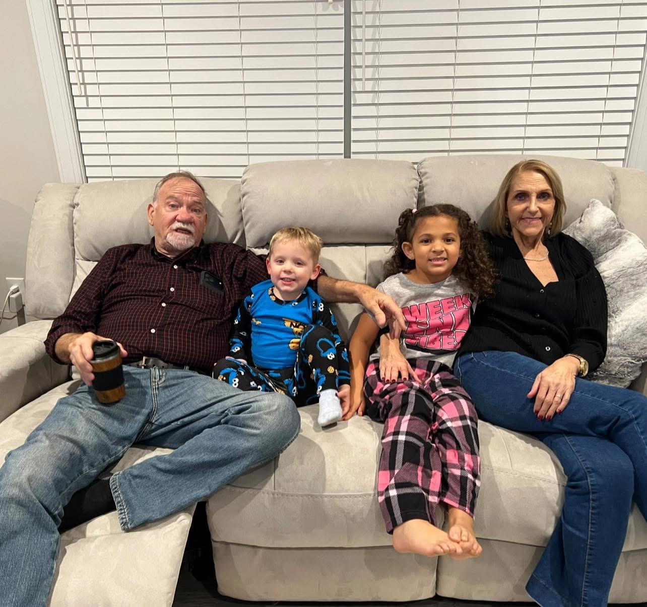 A group of people sitting on a couch