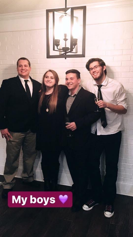 A group of people posing for a photo