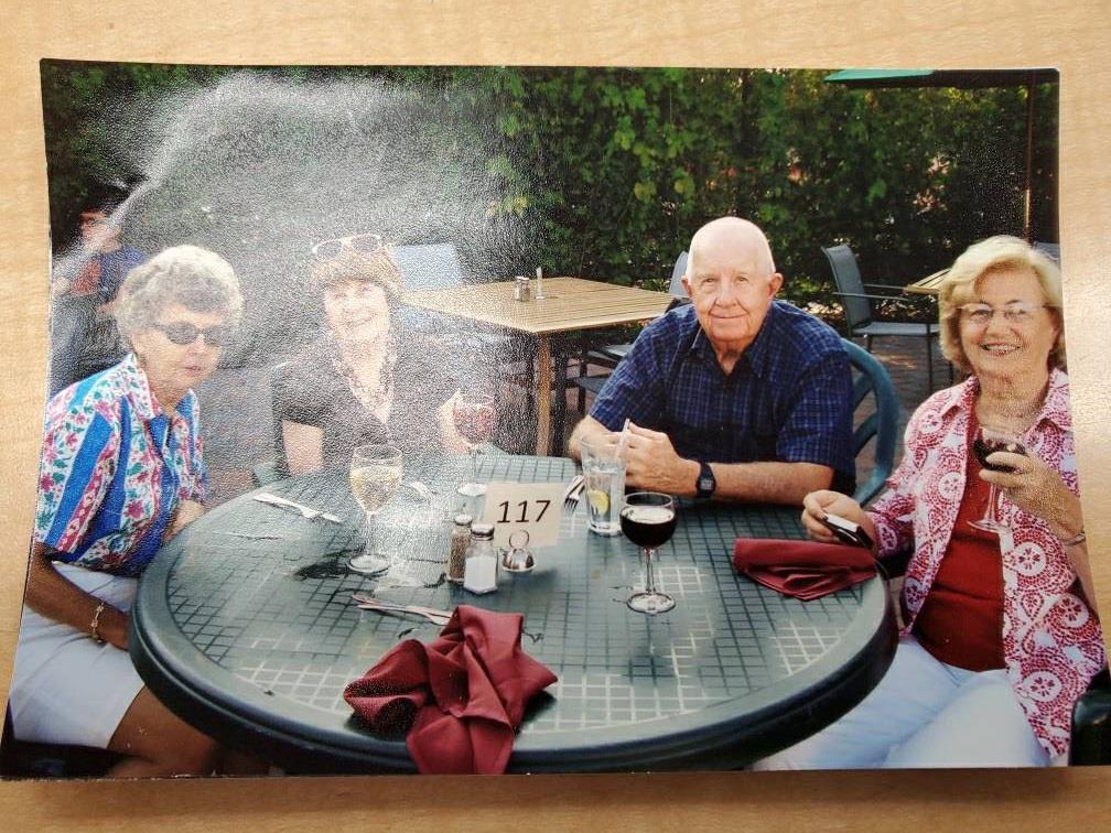 A group of people sitting at a table