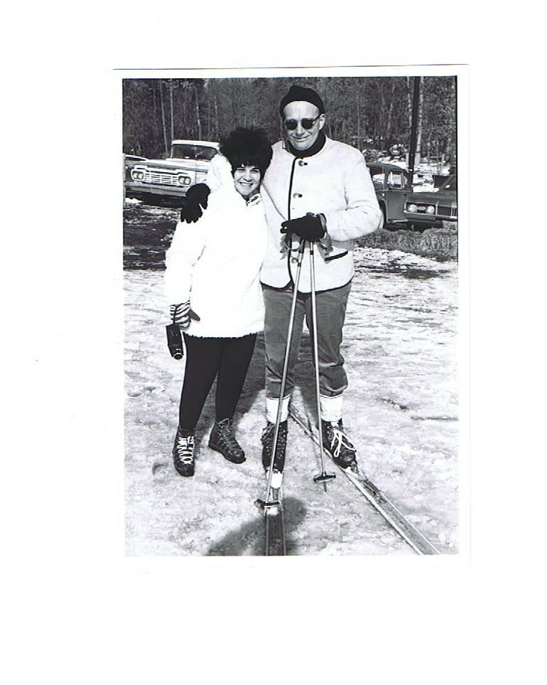 A man and woman on skis