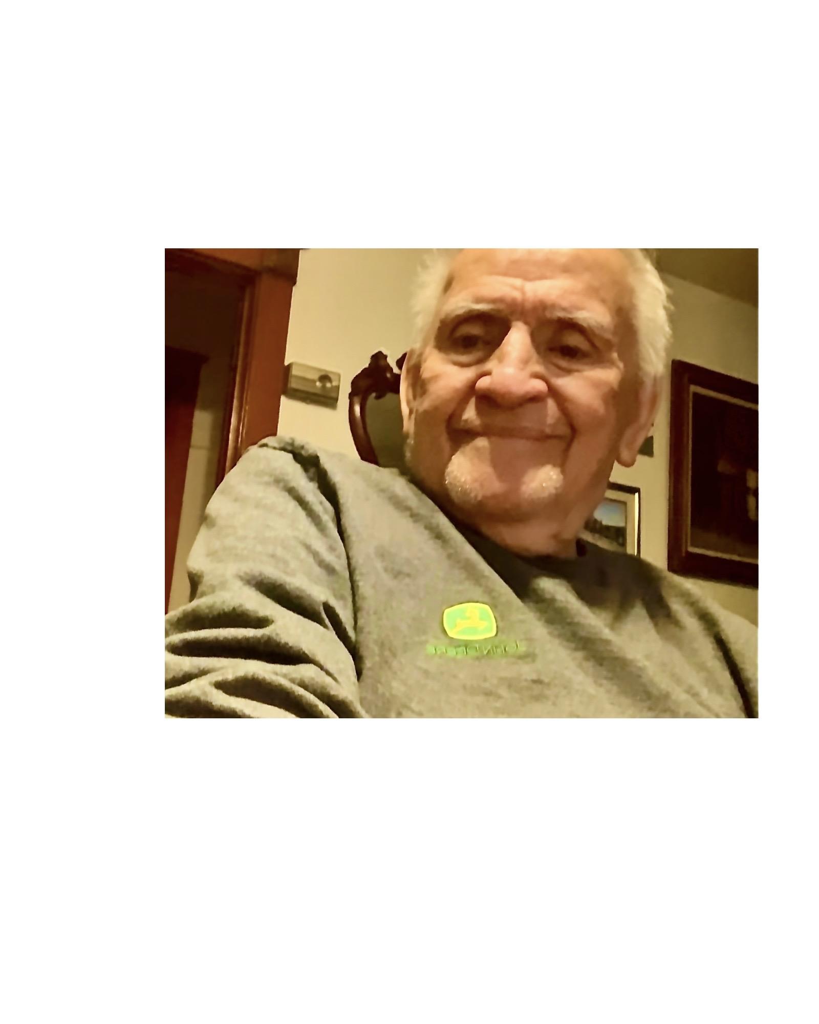 A man smiling at the camera