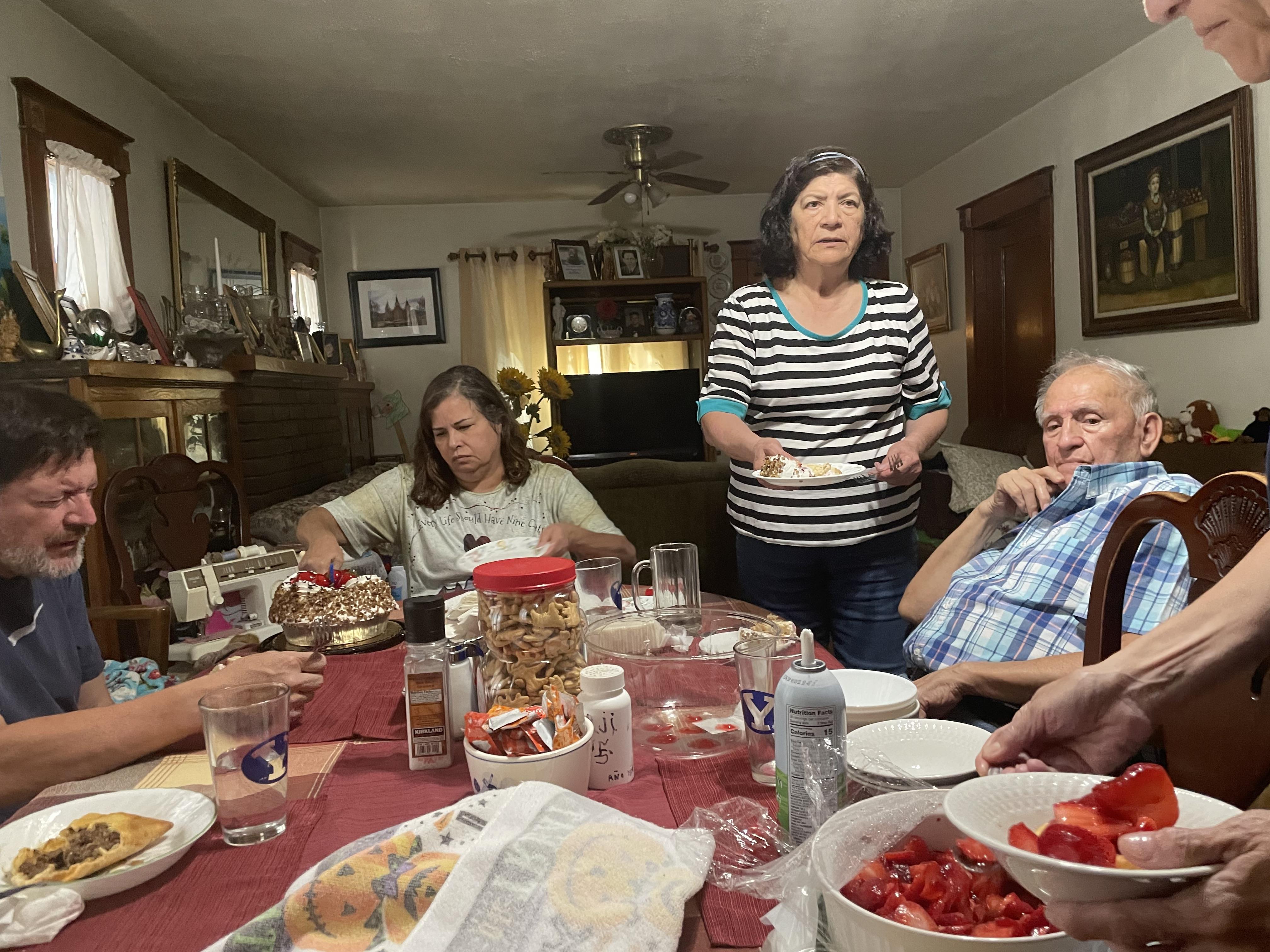 A group of people around a table