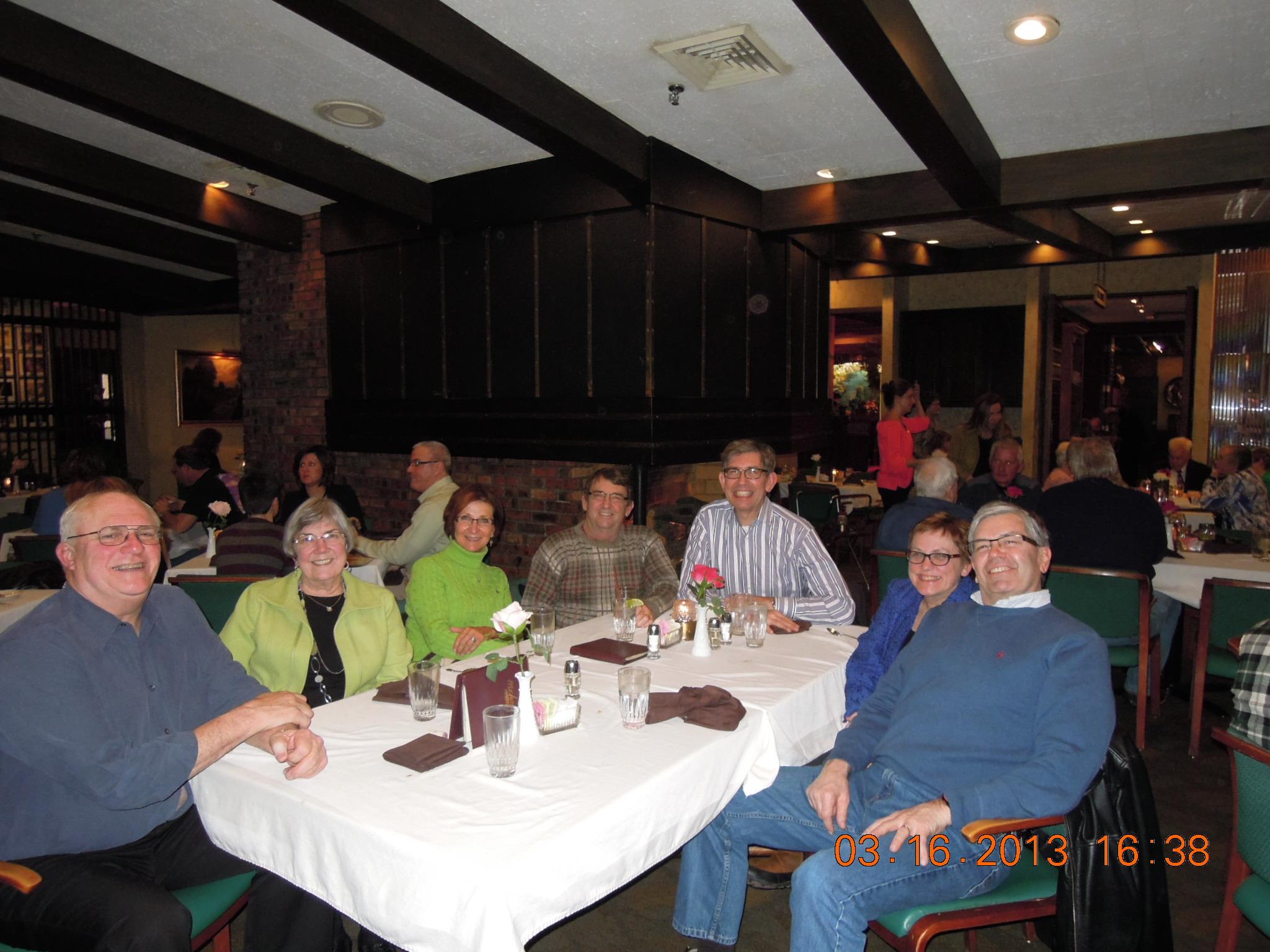 A group of people sitting at a table