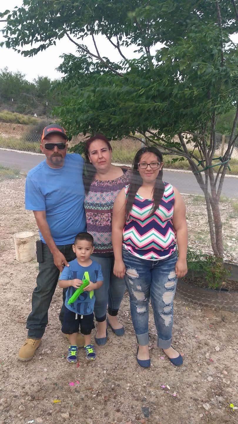 A group of people standing together outside