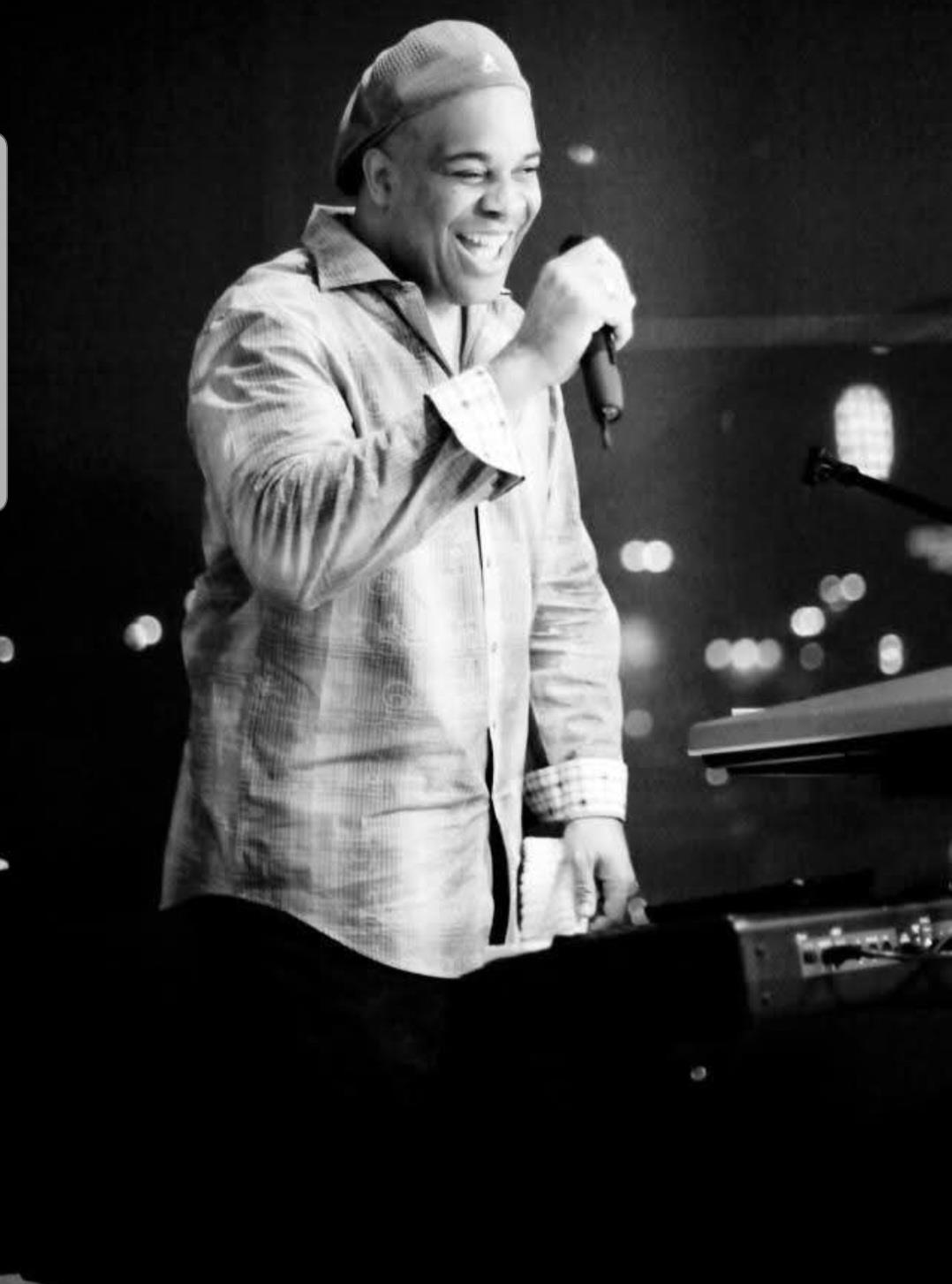 A man singing into a microphone