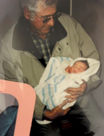 A man holding a baby