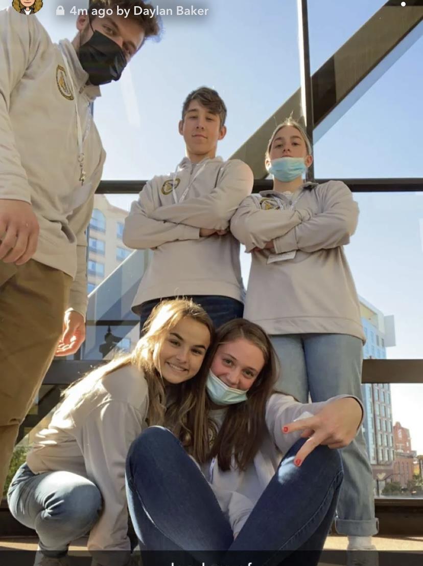 A group of people posing for a photo