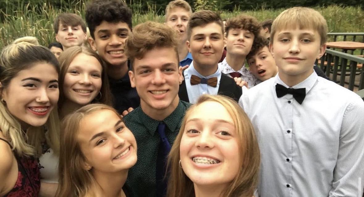 A group of people posing for a photo