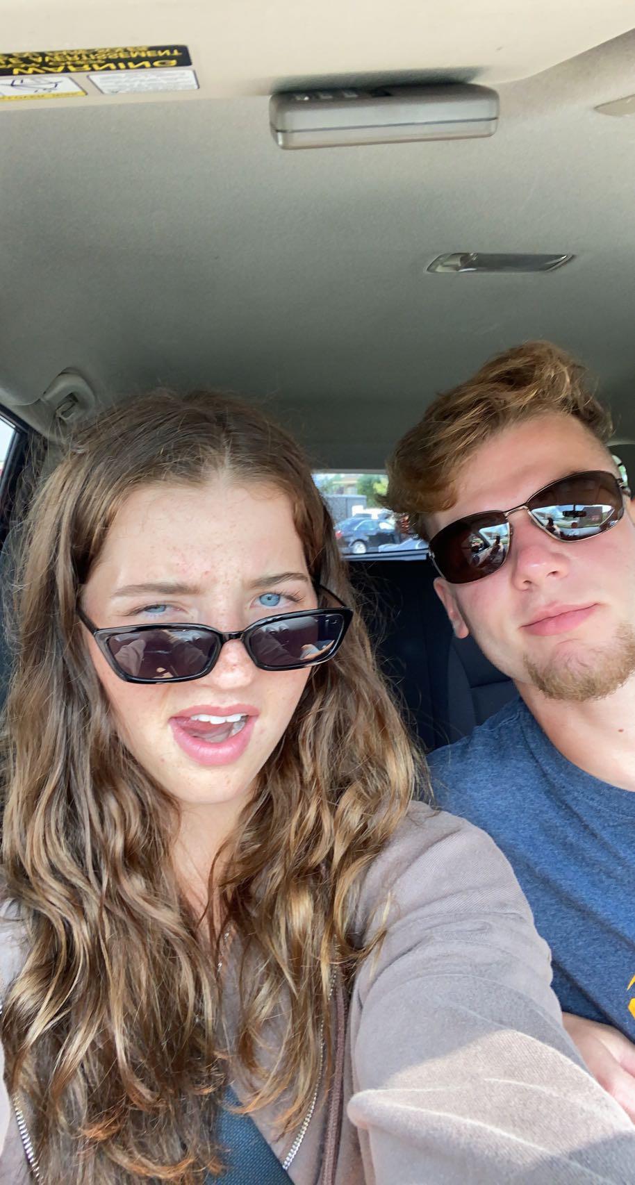 A man and woman taking a selfie