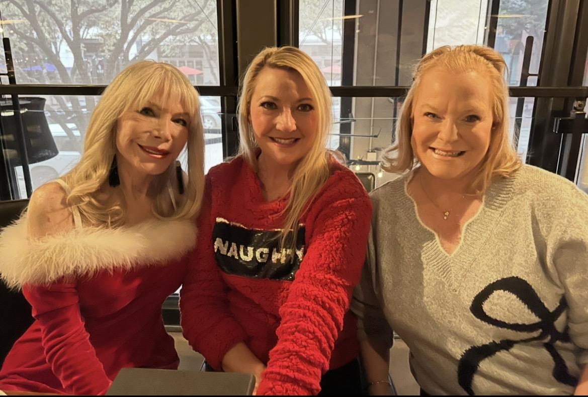 A group of women posing for a picture