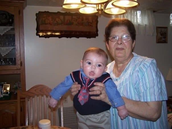 A woman holding a baby