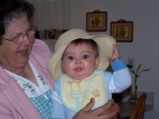 A woman holding a baby