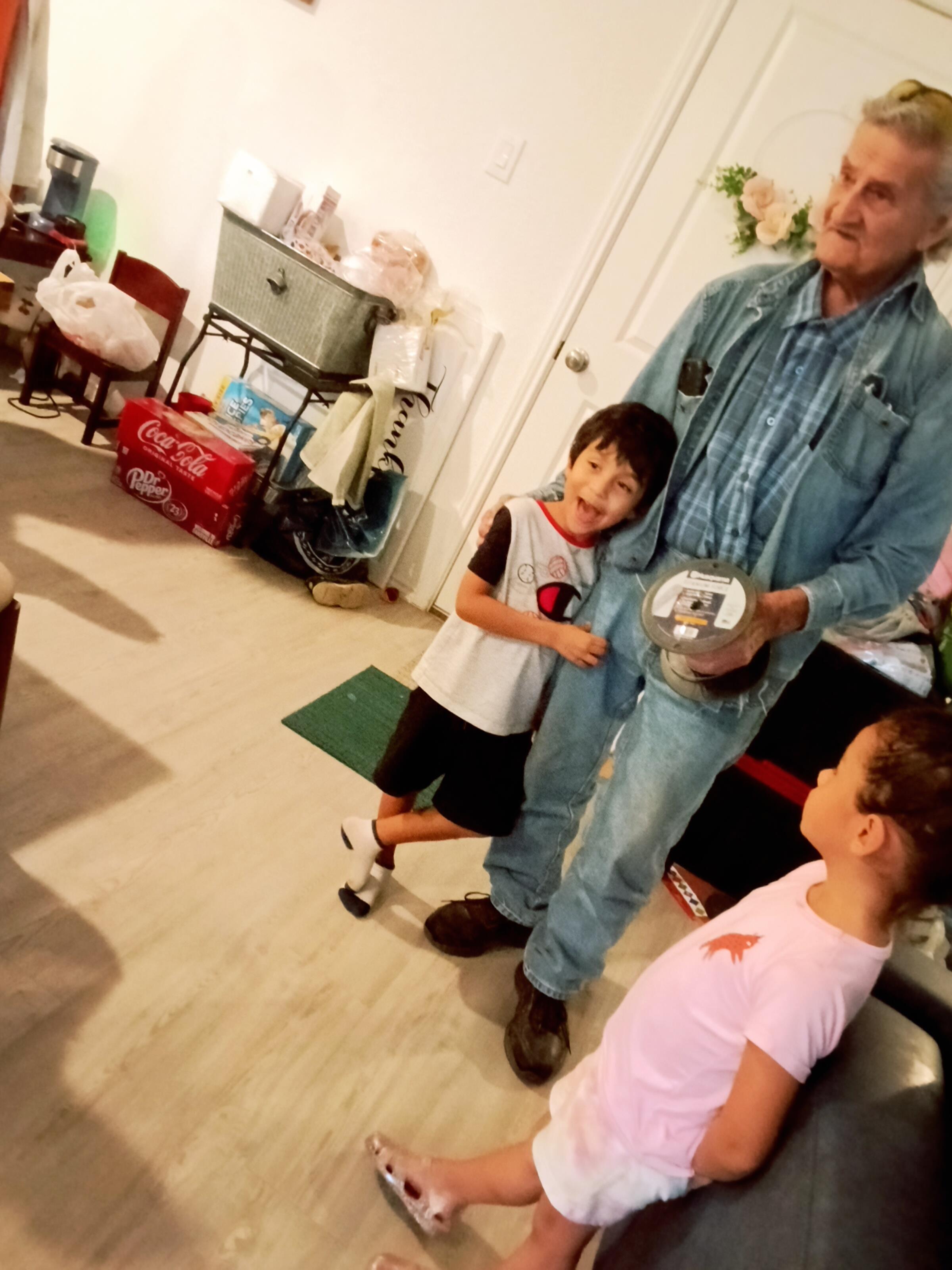 A man holding a roll of tape