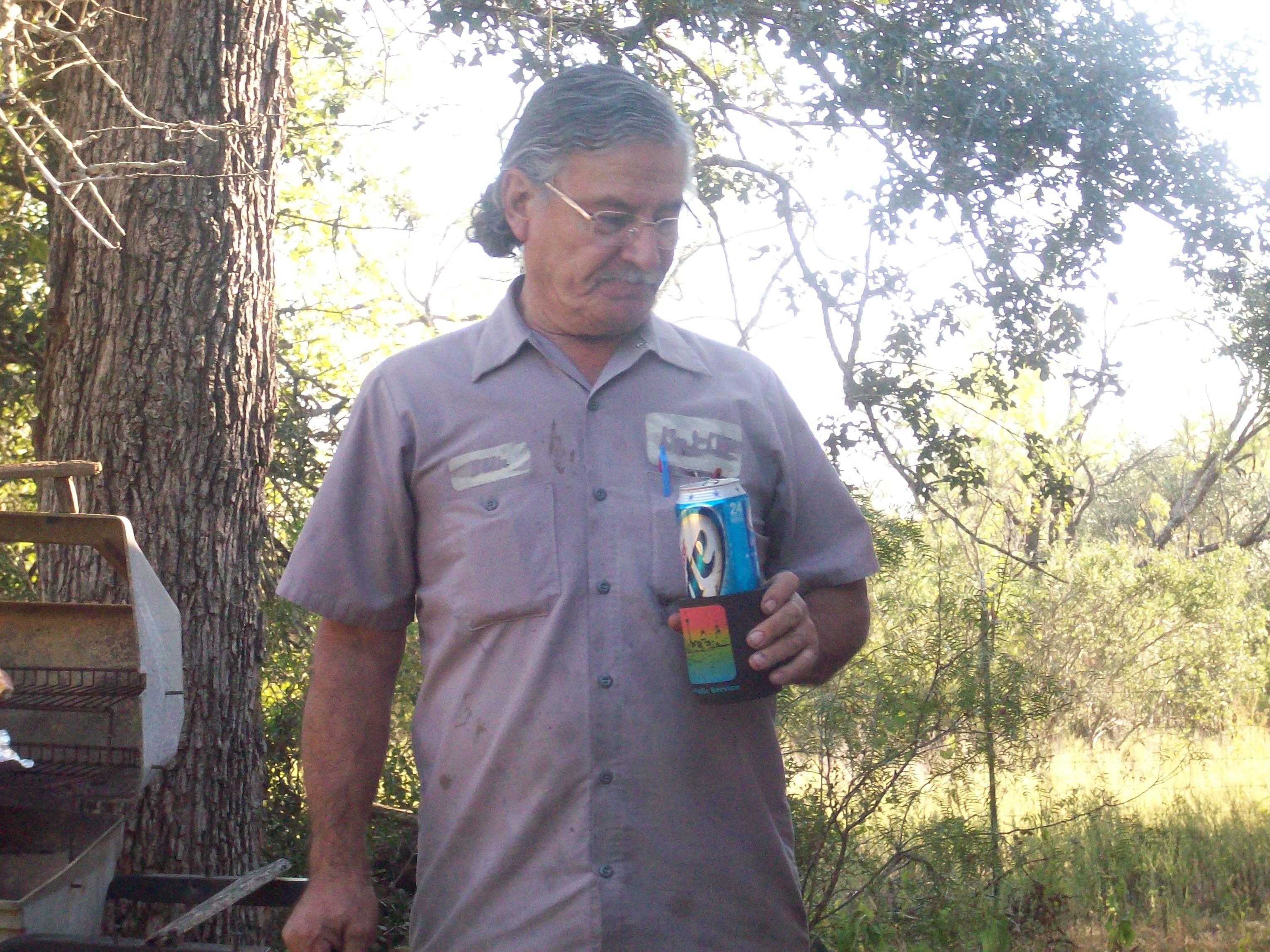 A man holding a can