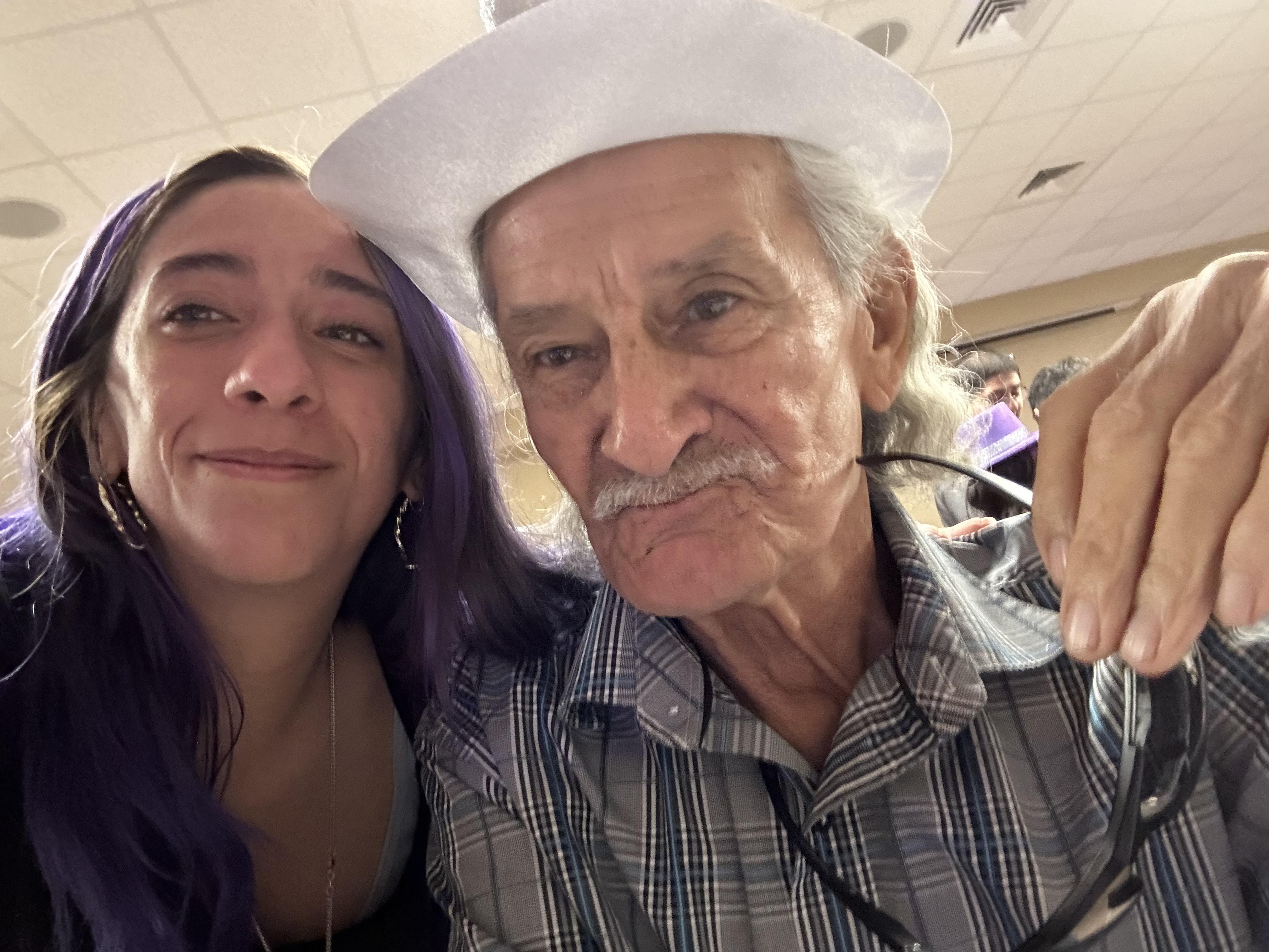 A man and woman taking a selfie