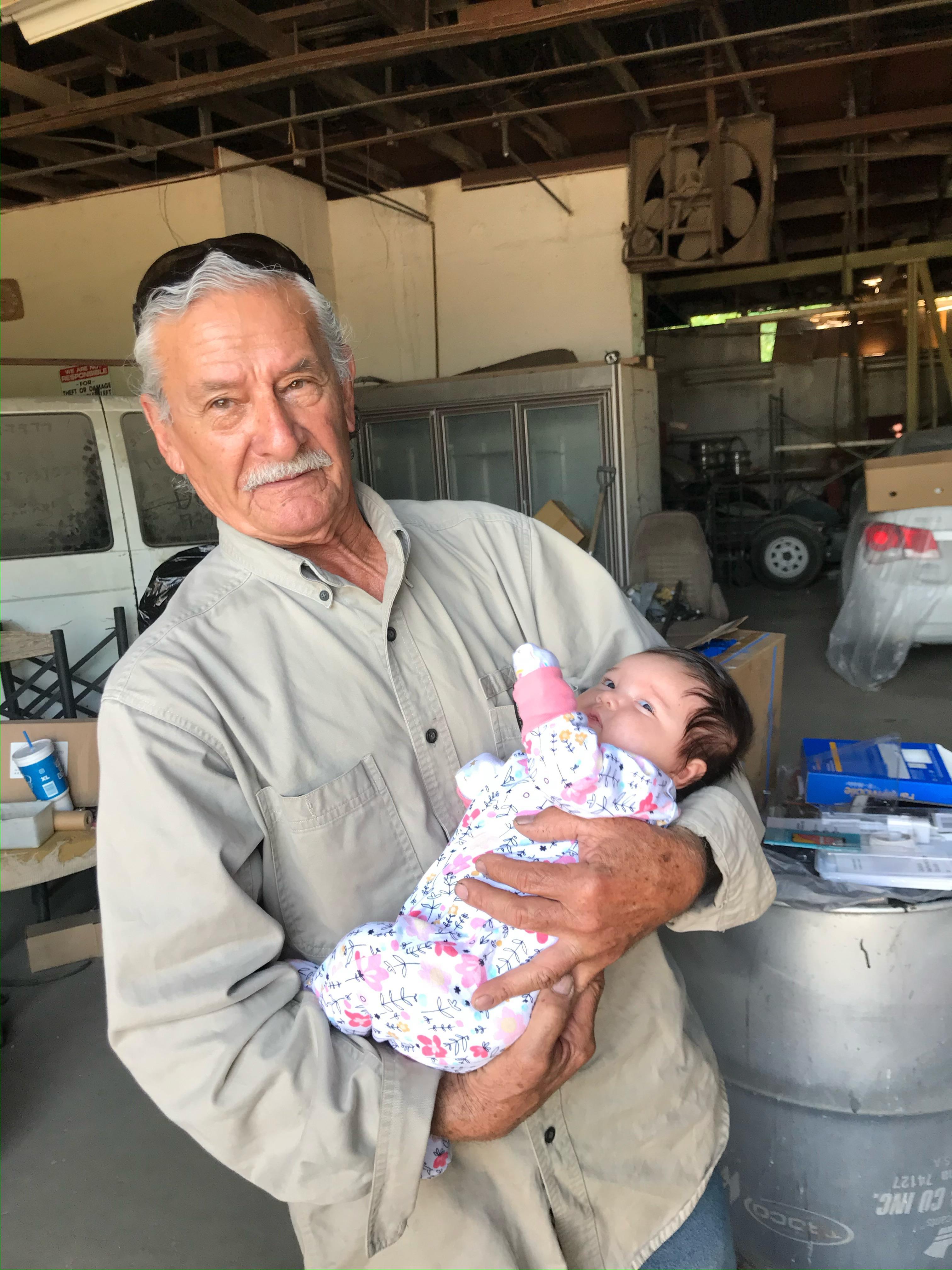A man holding a baby