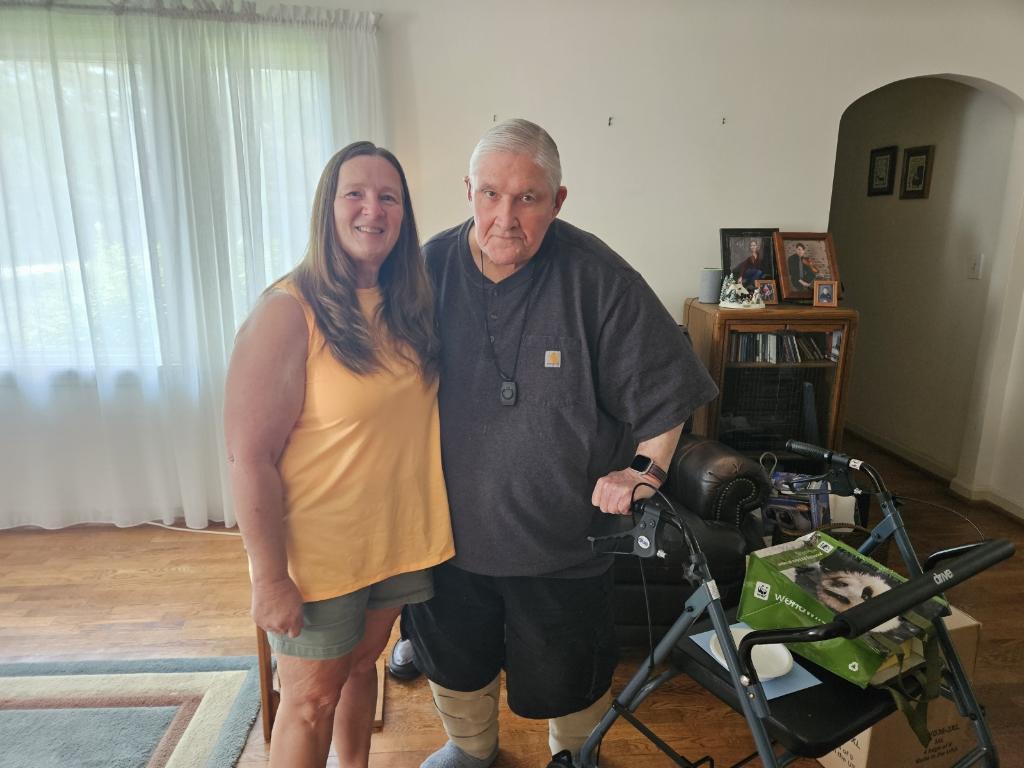 A man and woman standing next to each other