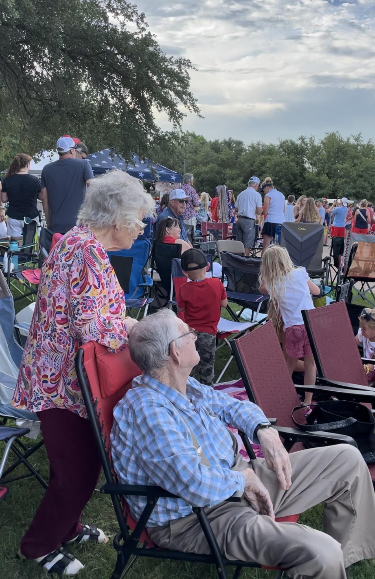 A group of people sitting in chairs