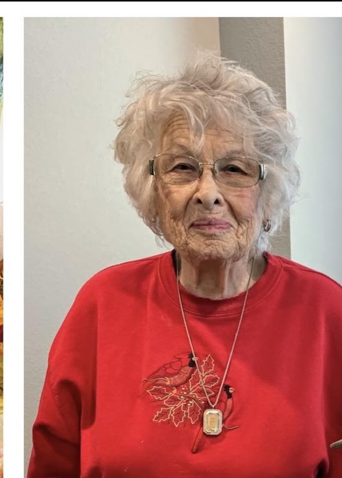 A woman wearing a red shirt