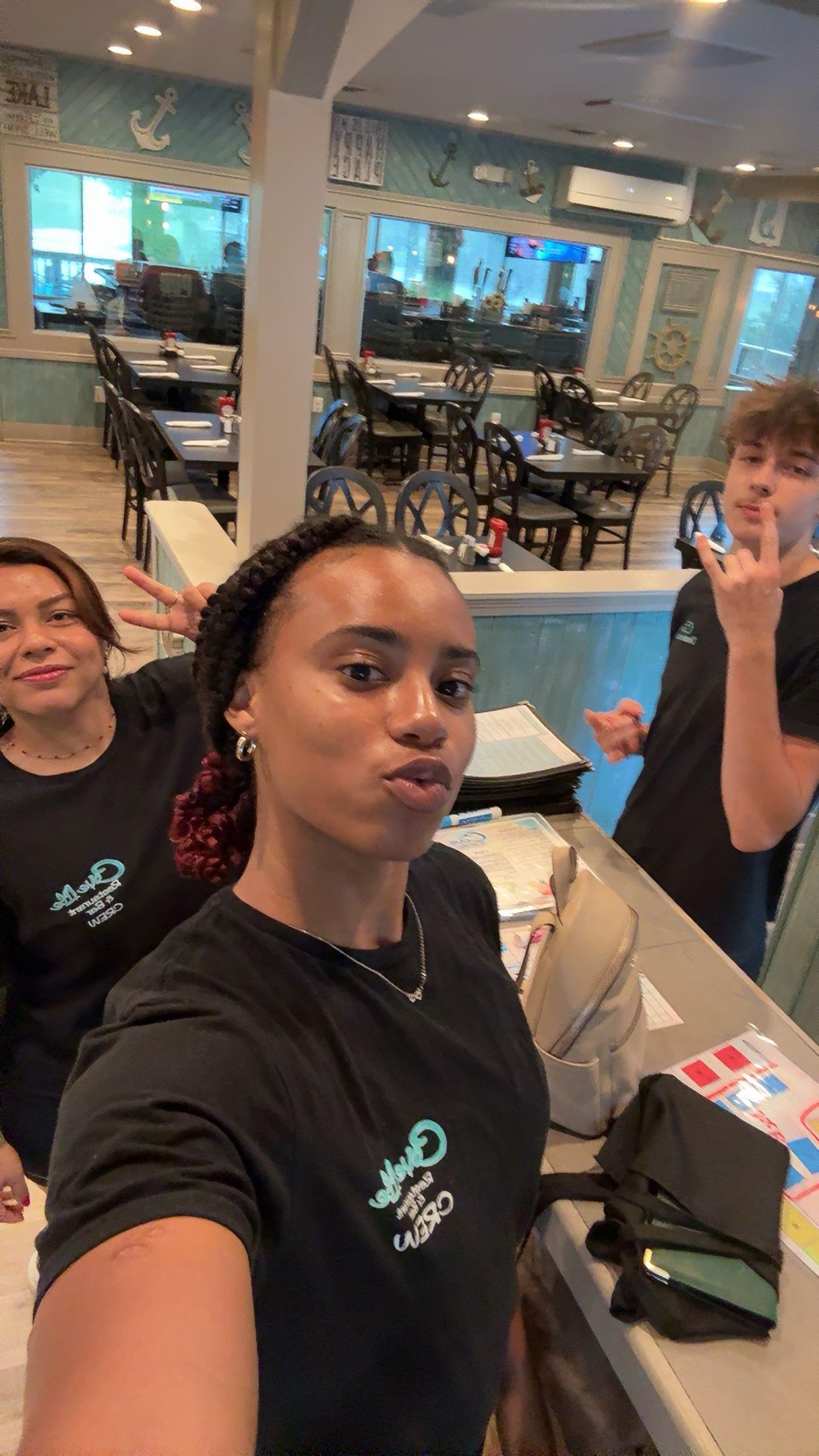 A group of people taking a selfie