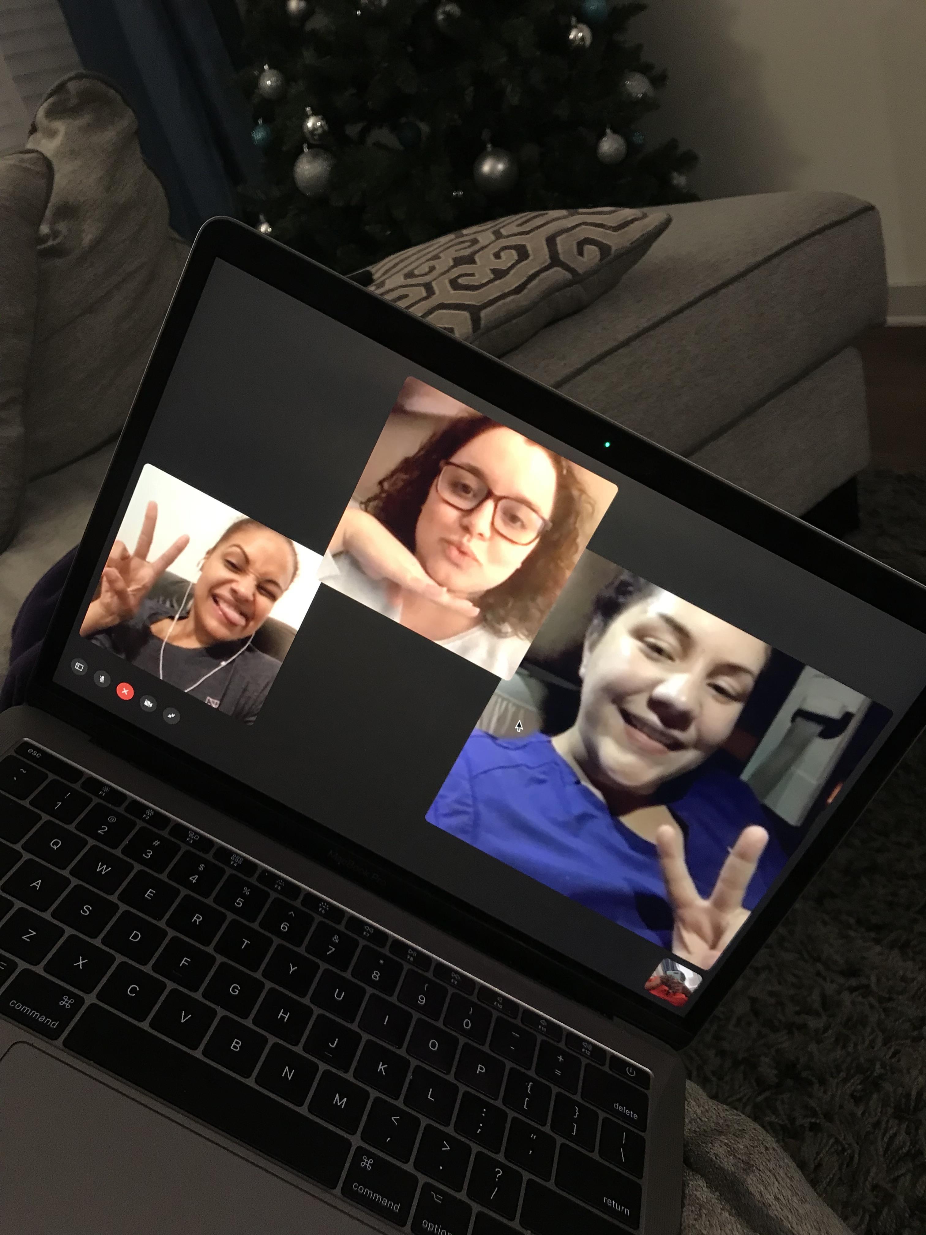 A laptop with a group of people on it