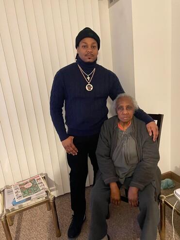 A man standing next to a woman