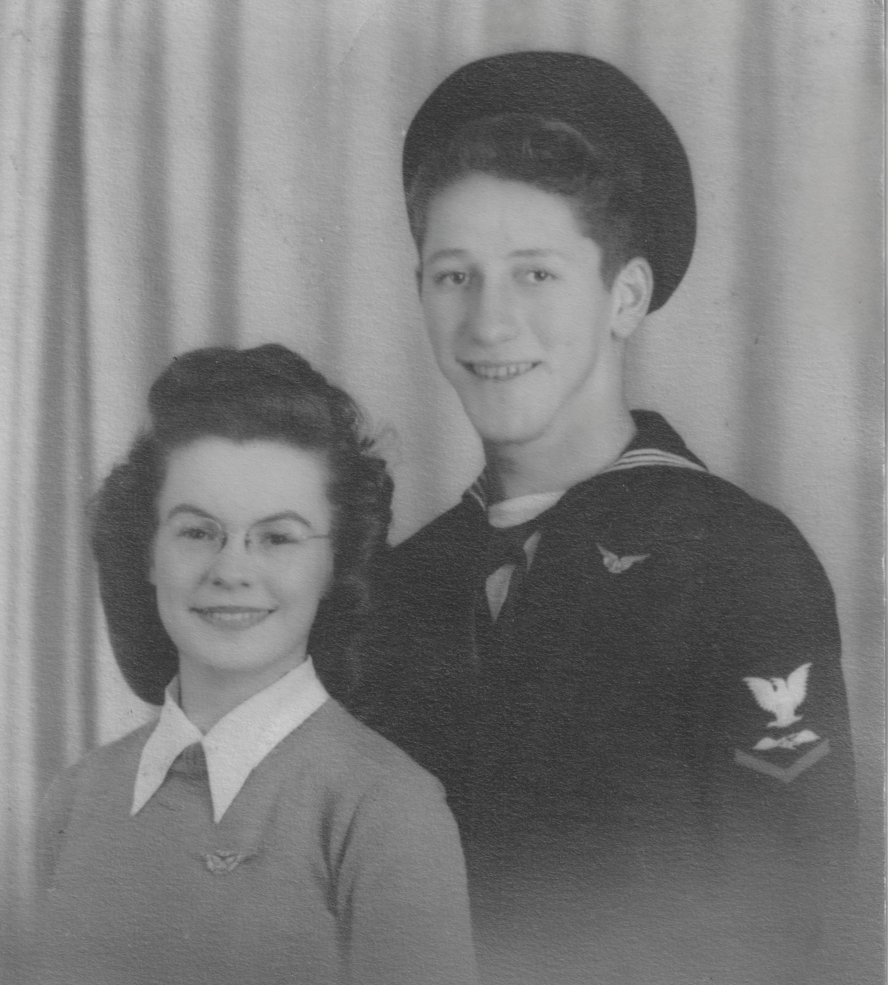 A man and woman posing for a photo