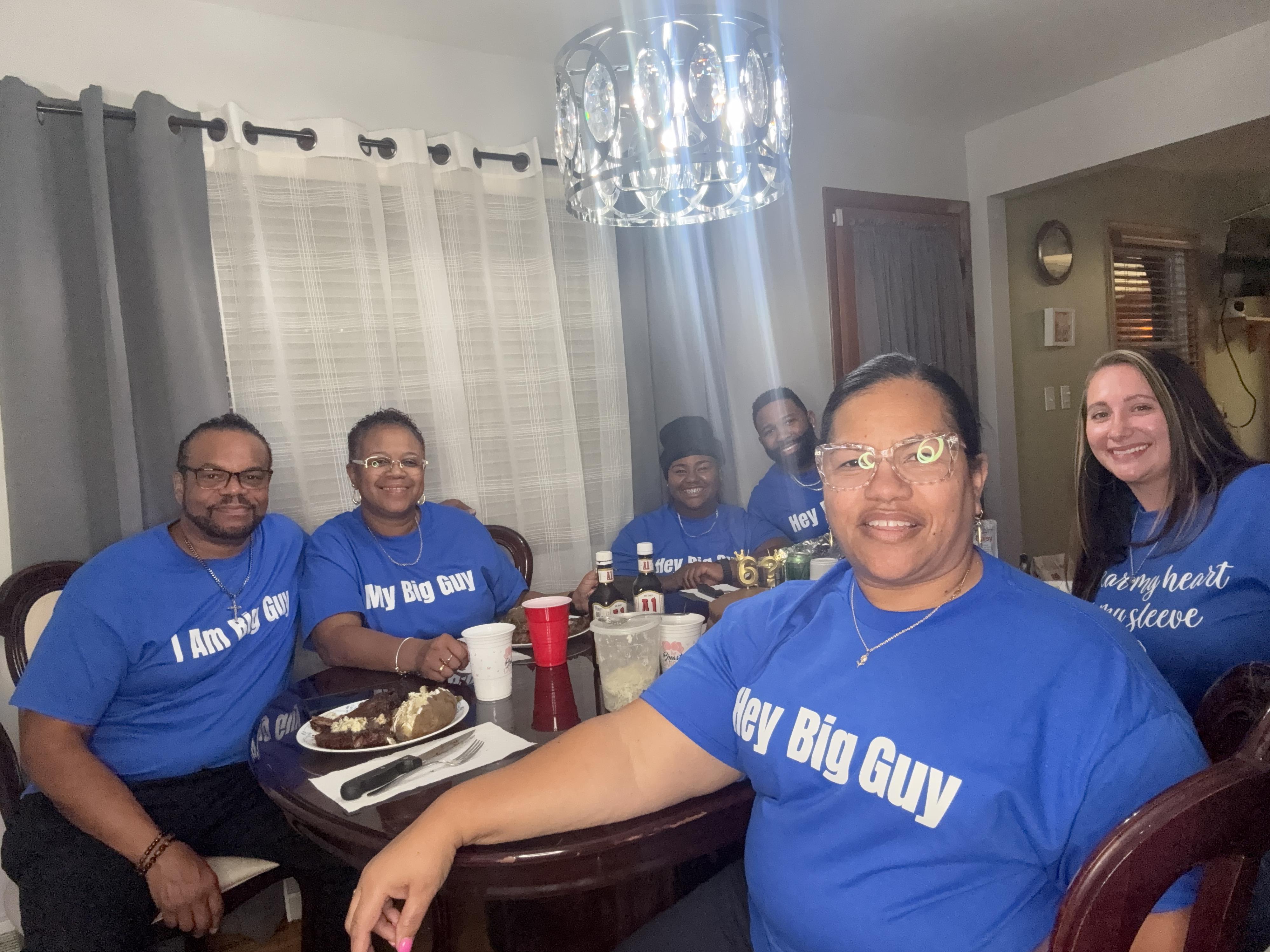 A group of people sitting at a table