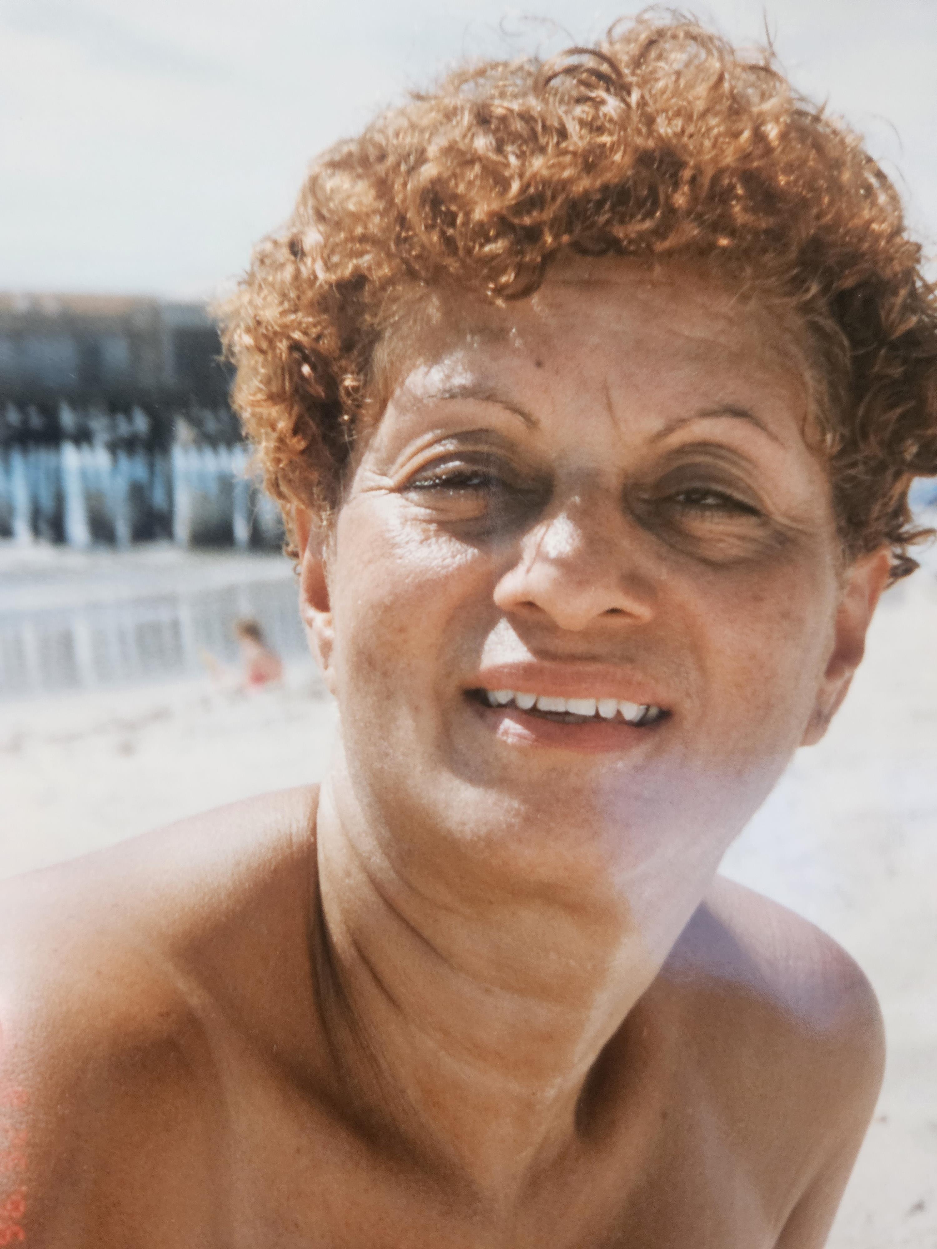 A woman smiling at the camera