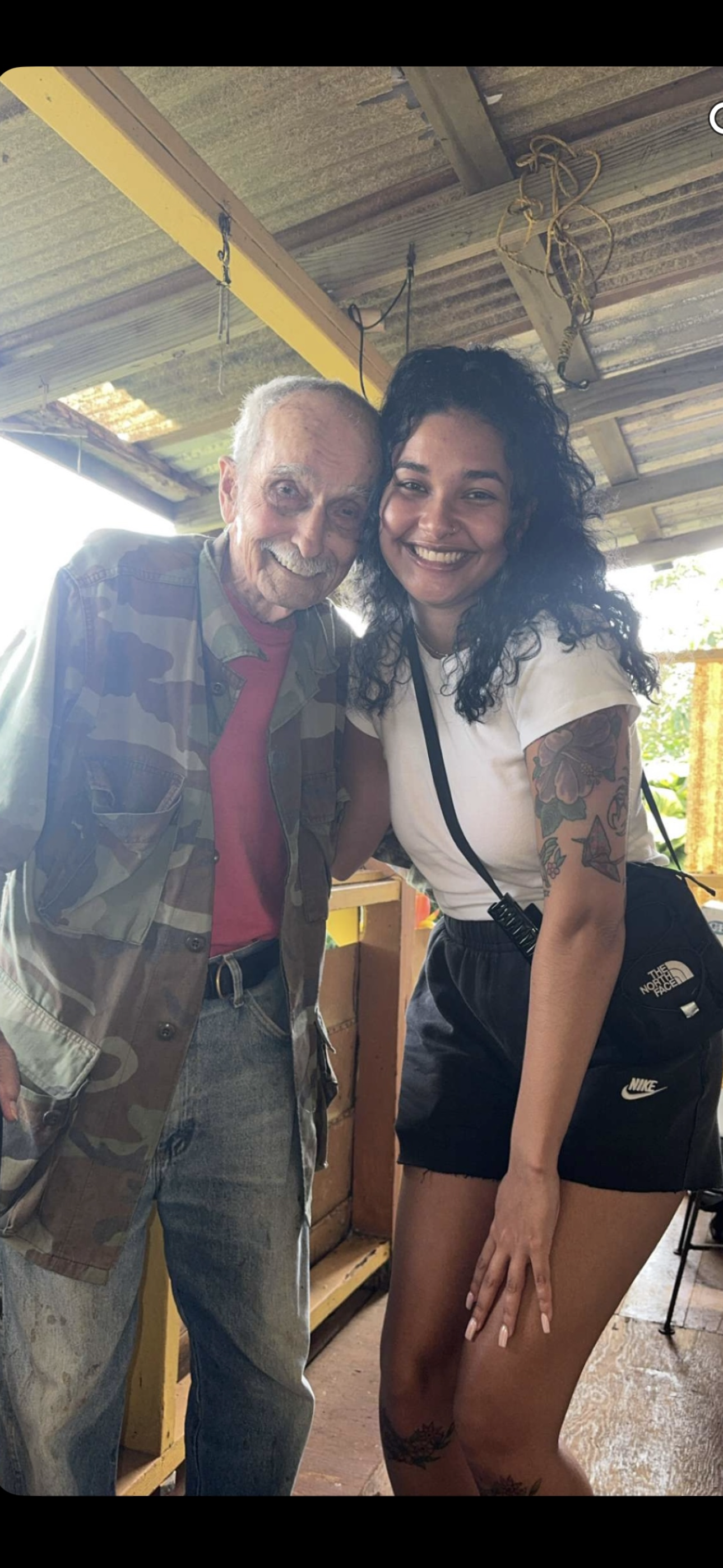 A man and woman posing for a picture