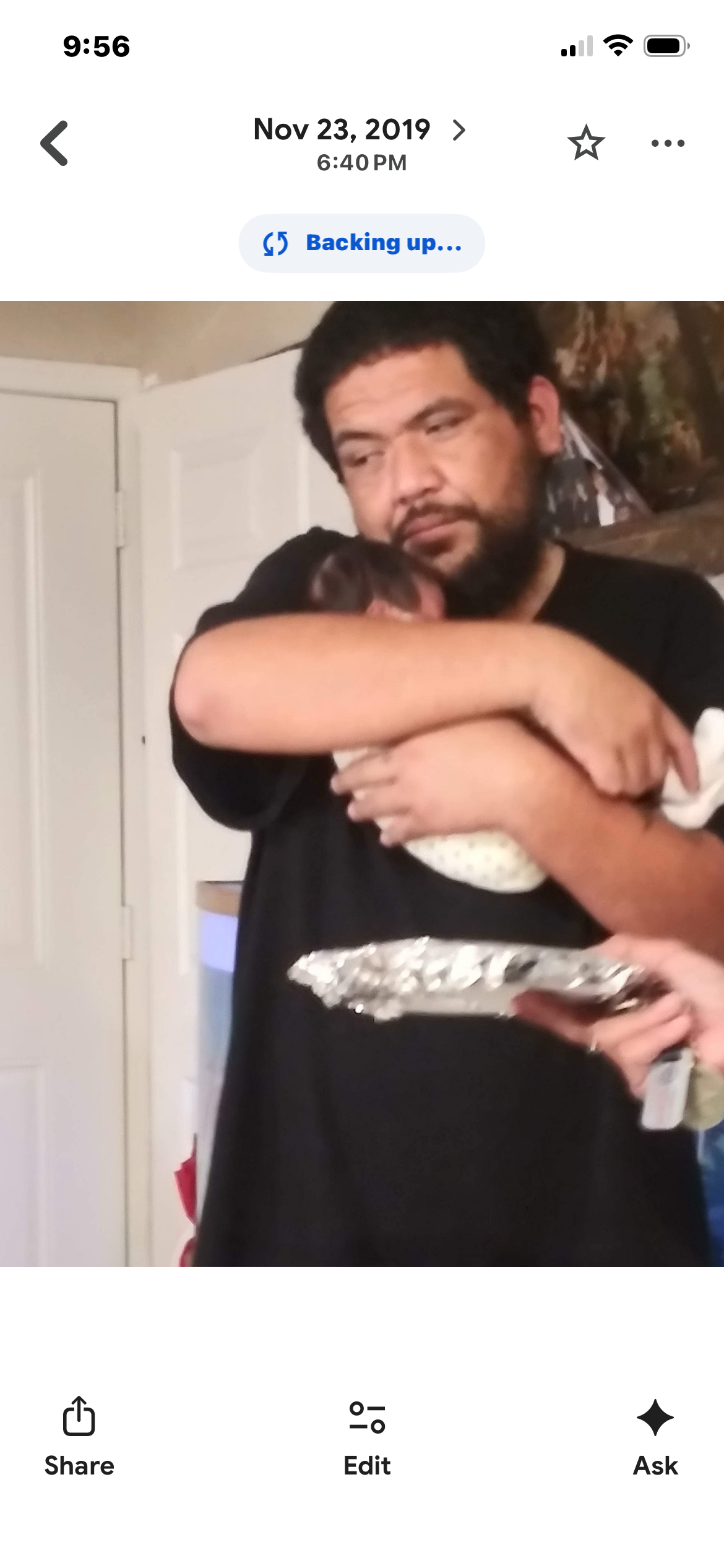 A man holding a baby