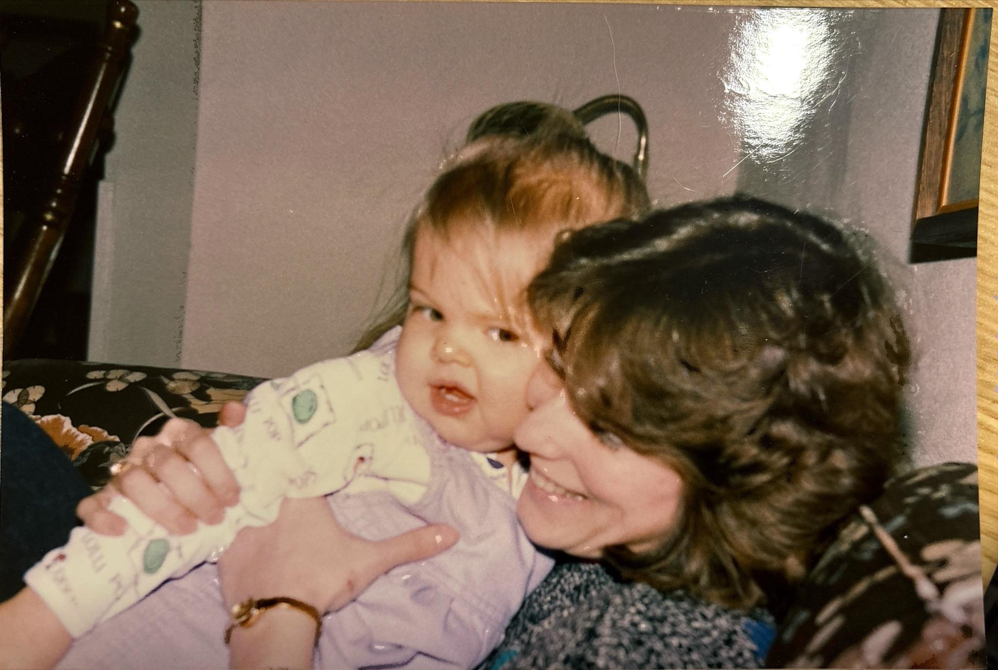 A woman holding a baby